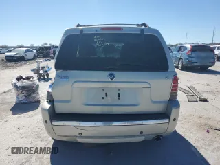2005 Mercury Mariner Luxury z VIN 4M2CU56125DJ17538, wystawiony jako Copart lot #46948345 z przebiegiem 158 277 mil mil oraz Szkoda całkowita • Salvage title. Historia ofert i sprzedaży dostępna na DreamBid. Obrazek 6.