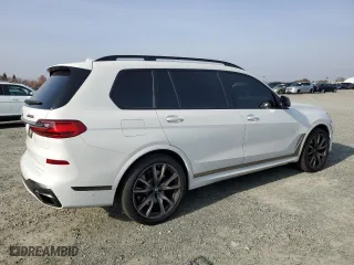 2020 BMW X7 M50i with VIN 5UXCX6C07LLE35920, listed as a Copart auction lot 83606344 with 99,780 mi miles and Clean Title. Bid and sale history available at carsss.com. Image 3.