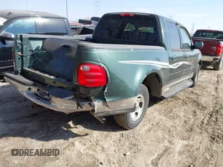 2002 Ford F-150 XLT with VIN 1FTRW07672KB47813, listed as a IAAI auction lot 41788462 with 234,684 mi miles. Bid and sale history available at carsss.com. Image 6.