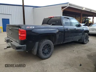 2017 Chevrolet Silverado 1500 LT with VIN 1GCVKREC1HZ225218, listed as a Copart auction lot 48948735 with 114,627 mi miles and Salvage Title. Bid and sale history available at DreamBid. Image 3.