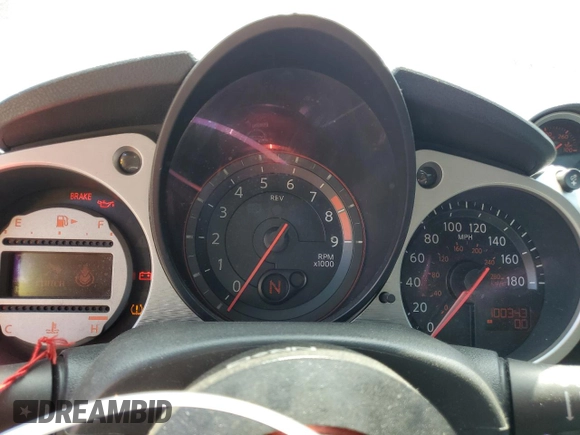 2010 Nissan 370Z with VIN JN1AZ4EH3AM504779, listed as a Copart auction lot 52937415 with 100,343 mi miles and Clean Title. Bid and sale history available at carsss.com. Image 9.