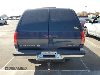 1997 GMC Suburban with VIN 1GKGK26J7VJ748464, listed as a Copart auction lot 52597135 with 176,109 mi miles and Salvage Title. Bid and sale history available at carsss.com. Image 6.
