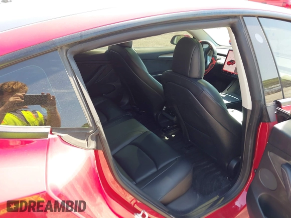 2022 Tesla Model 3 with VIN 5YJ3E1EA7NF152114, listed as a IAAI auction lot 42097399 with 96,726 mi miles. Bid and sale history available at carsss.com. Image 8.