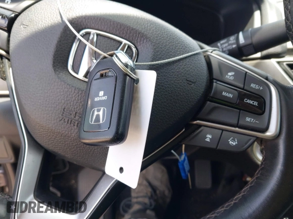 2019 Honda Accord Touring with VIN 1HGCV2F93KA013002, listed as a IAAI auction lot 42519920 with 76,841 mi miles and . Bid and sale history available at DreamBid. Image 11.