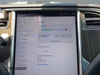 2013 Tesla Model S Performance with VIN 5YJSA1CP5DFP25346, listed as a IAAI auction lot 42463047 with 112,909 mi miles and . Bid and sale history available at DreamBid. Image 18.