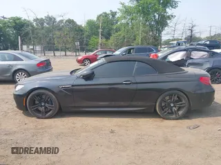 2014 BMW M6 z VIN WBSLZ9C5XEDZ78402, wystawiony jako IAAI lot #42399055 z przebiegiem 127 803 mil mil oraz . Historia ofert i sprzedaży dostępna na DreamBid. Obrazek 14.