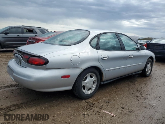 1999 Ford Taurus SE with VIN 1FAFP53U2XA134648, listed as a Copart auction lot 54305325 with 56,794 mi miles and Clean title. Bid and sale history available at DreamBid. Image 3.