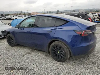 2021 Tesla Model Y Long Range with VIN 5YJYGDEEXMF213376, listed as a Copart auction lot 39659674 with 76,110 mi miles and Salvage Title. Bid and sale history available at DreamBid. Image 2.