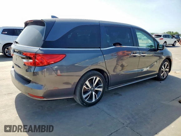 2023 Honda Odyssey Touring with VIN 5FNRL6H89PB053593, listed as a Copart auction lot 64836685 with 26,568 mi miles and Salvage title. Bid and sale history available at DreamBid. Image 3.
