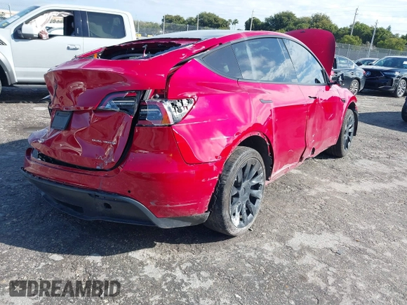 2022 Tesla Model Y Long Range z VIN 7SAYGDEE1NF385414, wystawiony jako IAAI lot #41660542 z przebiegiem 54 075 mil mil oraz . Historia ofert i sprzedaży dostępna na DreamBid. Obrazek 4.