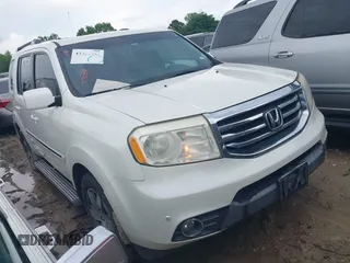 2013 Honda Pilot Touring with VIN 5FNYF3H94DB021530, listed as a IAAI auction lot 42326553 with 148,822 mi miles and . Bid and sale history available at DreamBid. Image 1.
