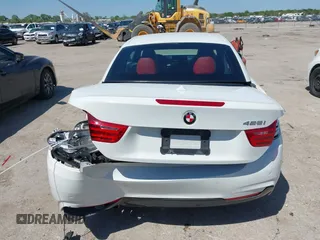 2015 BMW 4 Series 428i z VIN WBA3V7C52FP771779, wystawiony jako IAAI lot #41953647 z przebiegiem 66 003 mil mil oraz . Historia ofert i sprzedaży dostępna na DreamBid. Obrazek 16.