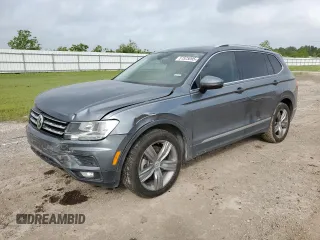 2021 Volkswagen Tiguan SE with VIN 3VV3B7AX3MM013955, listed as a Copart auction lot 51525095 with 103,626 mi miles and Salvage Title. Bid and sale history available at DreamBid. Image 1.