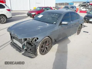 2023 BMW 5 Series 530i xDrive with VIN WBA13BJ04PCL98504, listed as a IAAI auction lot 41702411 with 27,830 mi miles and . Bid and sale history available at DreamBid. Image 2.