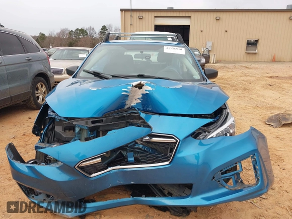 2019 Subaru Impreza with VIN 4S3GTAA64K3718084, listed as a IAAI auction lot 41726910 with 56,523 mi miles and . Bid and sale history available at DreamBid. Image 12.