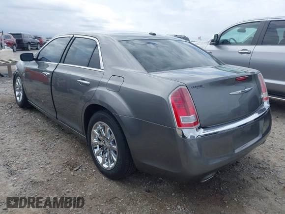 2012 Chrysler 300 Limited with VIN 2C3CCACG4CH308408, listed as a IAAI auction lot 41734589 with 135,813 mi miles. Bid and sale history available at carsss.com. Image 3.