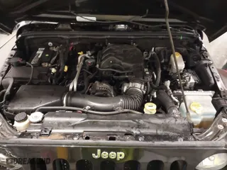 2015 Jeep Wrangler Sport with VIN 1C4AJWAG9FL585572, listed as a IAAI auction lot 41944288 with 96,572 mi miles. Bid and sale history available at carsss.com. Image 10.