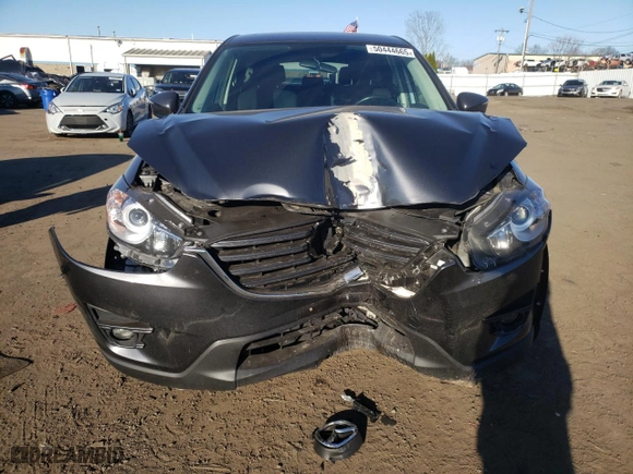 2016 Mazda CX-5 Touring with VIN JM3KE4CY7G0815137, listed as a Copart auction lot 50444665 with 61,681 mi miles and Salvage Title. Bid and sale history available at carsss.com. Image 5.