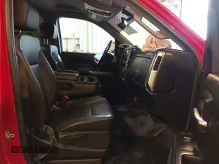 2017 Chevrolet Silverado 1500 LT with VIN 3GCUKREC9HG458520, listed as a IAAI auction lot 41364459 with 130,130 mi miles and . Bid and sale history available at DreamBid. Image 5.