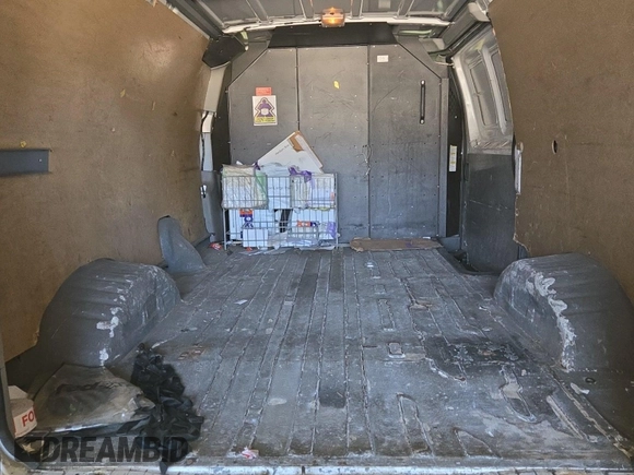 2010 Ford Econoline Cargo Commercial with VIN 1FTNE1EW4ADA91052, listed as a IAAI auction lot 42607935 with 163,519 mi miles and . Bid and sale history available at DreamBid. Image 16.