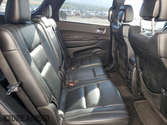 2013 Dodge Durango Crew z VIN 1C4RDJDG7DC584541, wystawiony jako Copart lot #55957665 z przebiegiem 142 639 mil mil oraz Czysty tytuł • Clean title. Historia ofert i sprzedaży dostępna na DreamBid. Obrazek 11.