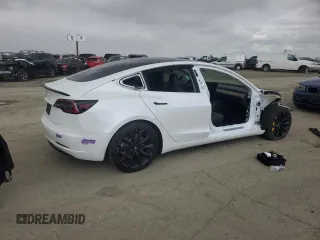 2019 Tesla Model 3 Mid Range with VIN 5YJ3E1EA8KF412886, listed as a Copart auction lot 50824565 with 54,803 mi miles and Salvage Title. Bid and sale history available at carsss.com. Image 3.