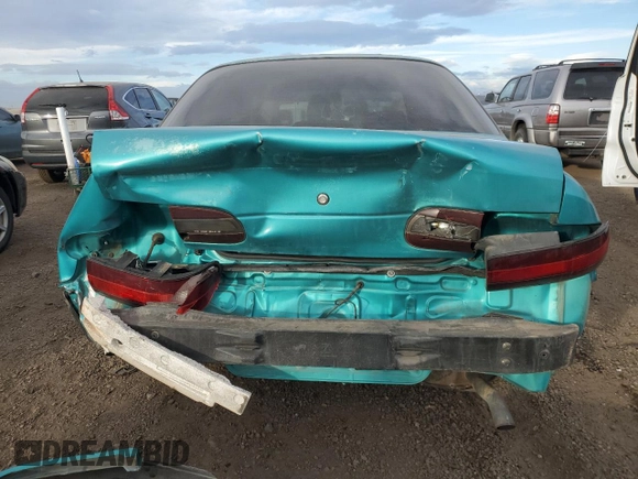 1993 Geo Prizm z VIN 1Y1SK5387PZ044239, wystawiony jako Copart lot #86178134 z przebiegiem 147 152 mil mil oraz Tytuł czysty. Historia ofert i sprzedaży dostępna na DreamBid. Obrazek 6.