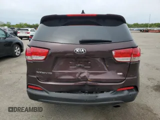 2016 Kia Sorento LX z VIN 5XYPG4A39GG061412, wystawiony jako Copart lot #57947885 z przebiegiem 134 381 mil mil oraz Szkoda całkowita • Salvage title. Historia ofert i sprzedaży dostępna na DreamBid. Obrazek 6.