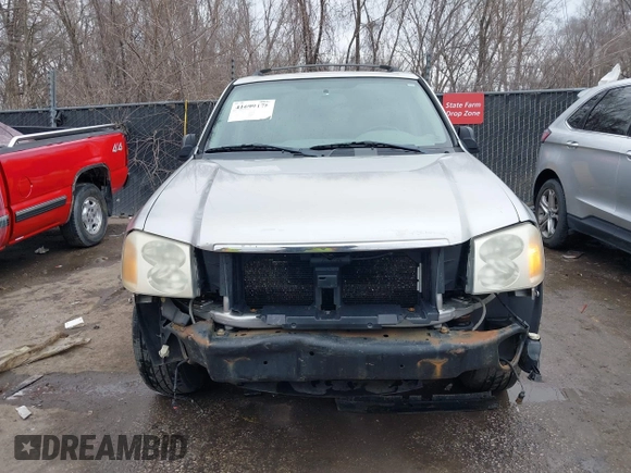 2005 GMC Envoy SLE with VIN 1GKDT13S552332088, listed as a IAAI auction lot 41699178 with 196,869 mi miles. Bid and sale history available at carsss.com. Image 6.