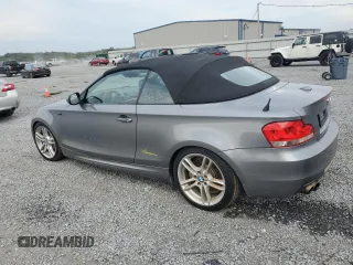 2012 BMW 1 Series 135i with VIN WBAUN7C59CVM26082, listed as a Copart auction lot 74711754 with 77,152 mi miles and Salvage title. Bid and sale history available at DreamBid. Image 2.