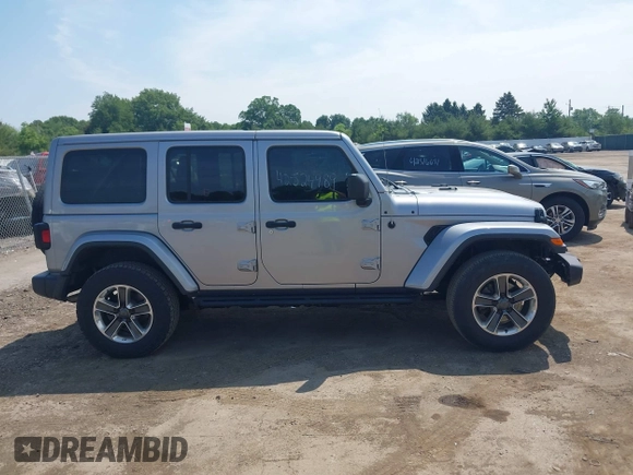 2019 Jeep Wrangler Unlimited Sahara with VIN 1C4HJXEN5KW542403, listed as a IAAI auction lot 42524989 with 60,451 mi miles and . Bid and sale history available at DreamBid. Image 13.