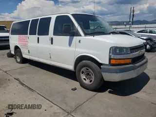 2015 Chevrolet Express Passenger LT with VIN 1GAZG1FG6F1217514, listed as a Copart auction lot 64759505 with 270,681 mi miles and Clean title. Bid and sale history available at DreamBid. Image 4.