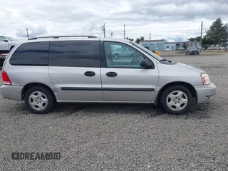 2004 Ford Freestar SE z VIN 2FMZA51664BA73569, wystawiony jako IAAI lot #39712844 z przebiegiem 182 013 mil mil oraz . Historia ofert i sprzedaży dostępna na DreamBid. Obrazek 13.