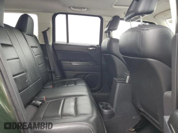 2009 Jeep Patriot Limited with VIN 1J4FT48B79D120490, listed as a Copart auction lot 55071885 with 173,311 mi miles and Salvage title. Bid and sale history available at DreamBid. Image 11.