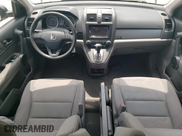 2010 Honda CR-V LX with VIN 3CZRE3H35AG705585, listed as a Copart auction lot 60032855 with 115,136 mi miles and Salvage title. Bid and sale history available at DreamBid. Image 8.