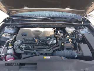 2025 Toyota Camry LE z VIN 4T1DAACK0SU500801, wystawiony jako IAAI lot #42123753 z przebiegiem 11 742 mil mil oraz . Historia ofert i sprzedaży dostępna na DreamBid. Obrazek 10.