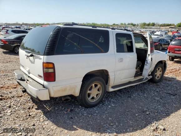 2002 GMC Yukon XL Denali with VIN 1GKFK66UX2J234858, listed as a Copart auction lot 51220475 with 246,553 mi miles and Salvage Title. Bid and sale history available at carsss.com. Image 3.