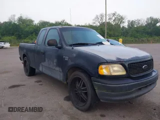 1999 Ford F-150 with VIN 2FTRX17W0XCB16529, listed as a IAAI auction lot 42040891 with 186,172 mi miles and . Bid and sale history available at DreamBid. Image 1.