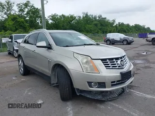 2014 Cadillac SRX Performance Collection with VIN 3GYFNCE35ES610504, listed as a IAAI auction lot 42133548 with 140,306 mi miles and . Bid and sale history available at DreamBid. Image 1.