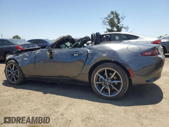 2021 Mazda MX-5 Miata Grand Touring with VIN JM1NDAD79M0458827, listed as a Copart auction lot 62238855 with 20,497 mi miles and Salvage title. Bid and sale history available at DreamBid. Image 2.