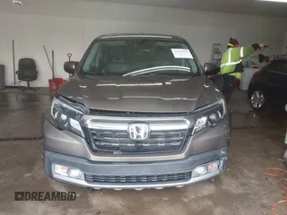 2020 Honda Ridgeline RTL-E with VIN 5FPYK3F75LB001516, listed as a IAAI auction lot 41605859 with 93,902 mi miles and . Bid and sale history available at DreamBid. Image 12.