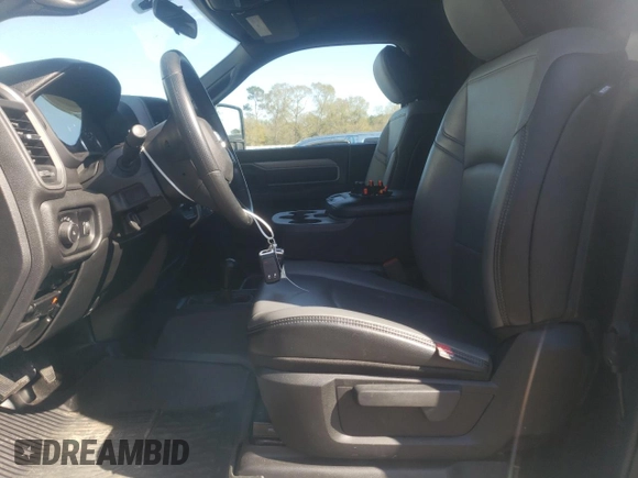 2024 Ram 2500 Tradesman with VIN 3C6MR5AJ2RG251257, listed as a Copart auction lot 50943035 with 7,128 mi miles and Salvage title. Bid and sale history available at DreamBid. Image 7.