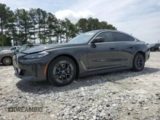 2023 BMW i4 eDrive40 with VIN WBY73AW03PFN64332, listed as a Copart auction lot 54061254 with 31,138 mi miles. Bid and sale history available at carsss.com. Image 1.