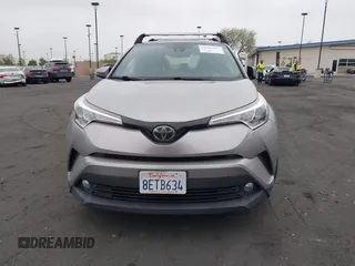2018 Toyota C-HR XLE with VIN JTNKHMBX5J1011568, listed as a IAAI auction lot 42043867 with 30,699 mi miles. Bid and sale history available at carsss.com. Image 13.