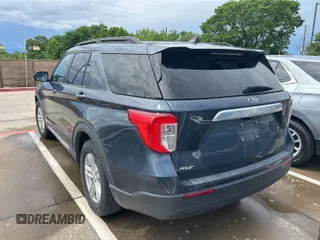 2022 Ford Explorer XLT with VIN 1FMSK7DH1NGB83527, listed as a IAAI auction lot 42154299 with 83,296 mi miles. Bid and sale history available at carsss.com. Image 1.