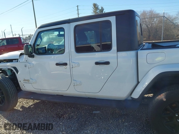2023 Jeep Gladiator High Altitude with VIN 1C6HJTFG4PL560982, listed as a IAAI auction lot 41236477 with 28,835 mi miles and . Bid and sale history available at DreamBid. Image 14.