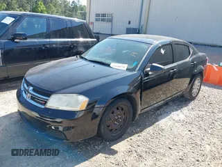 2014 Dodge Avenger SE with VIN 1C3CDZAB9EN173407, listed as a IAAI auction lot 42058578 with 197,205 mi miles and . Bid and sale history available at DreamBid. Image 2.