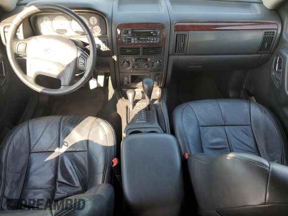 2004 Jeep Grand Cherokee Limited с VIN 1J8GW58N04C328283, выставлен на аукционе Copart как лот 62159095 с пробегом 147 593 миль миль и Списание • Salvage title. История ставок и продаж доступна на DreamBid. Изображение 8.