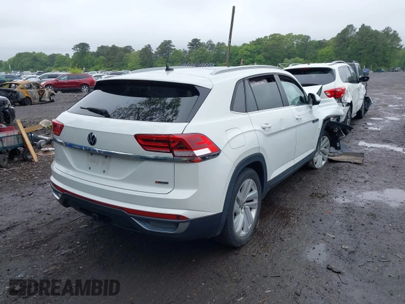 2021 Volkswagen Atlas SE z VIN 1V2KE2CAXMC202664, wystawiony jako IAAI lot #42292276 z przebiegiem 57 760 mil mil oraz . Historia ofert i sprzedaży dostępna na DreamBid. Obrazek 4.
