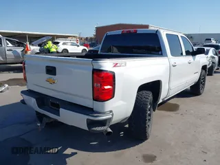 2016 Chevrolet Silverado 1500 LT with VIN 3GCUKREC8GG366278, listed as a IAAI auction lot 41993038 with 176,515 mi miles and . Bid and sale history available at DreamBid. Image 4.